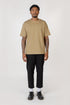 Model wearing light olve elias top, front view