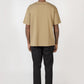 Model wearing olive elias top, back view