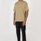 Model wearing black elias top, side view