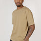 Model wearing olive elias top, close up view