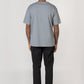 Model wearing Slate blue elias top, back view