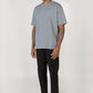 Model wearing Slate blue elias top, side view