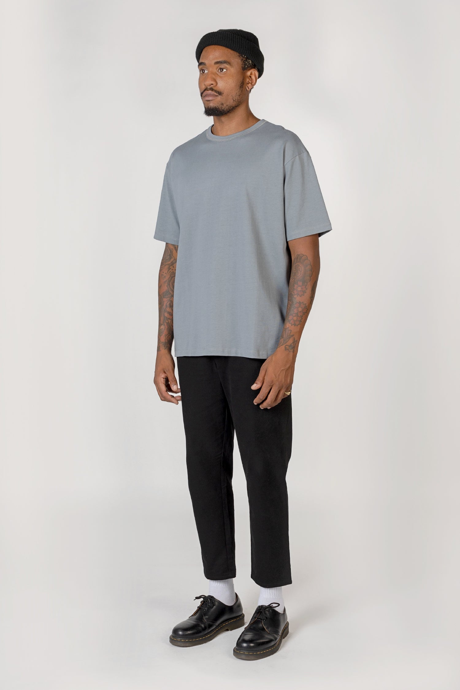 Model wearing Slate blue elias top, side view