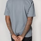 Model wearing Slate blue elias top, close up back view